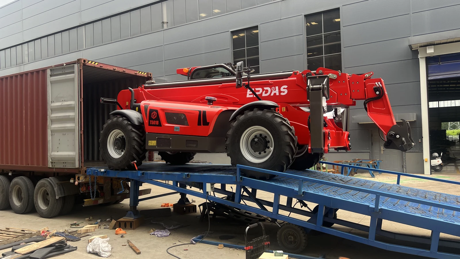 Red EPDAS T5018 being loaded into a shipping container
